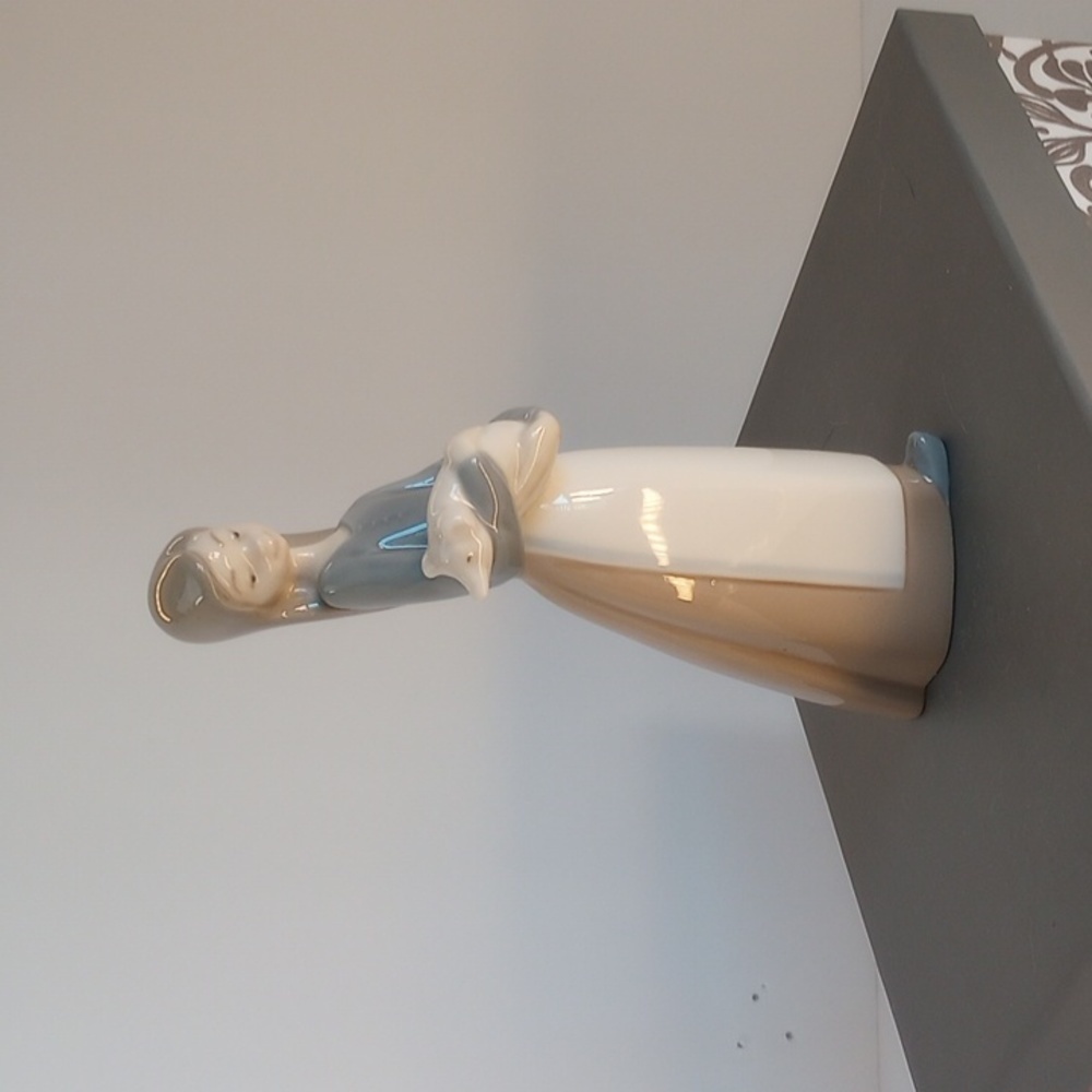 Vintage Lladro porcelain figurine of girl holding a pig